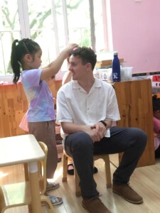 English teacher having fun at a kindergarten in China 